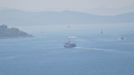 ferry and boats on a calm bay