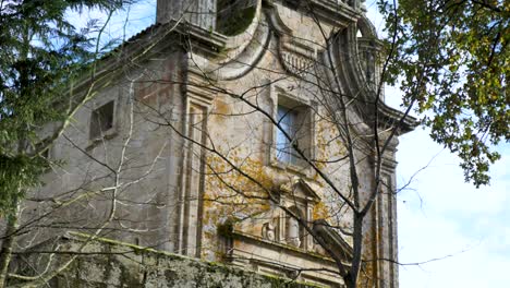 Tilt-up-reveals-well-known-Catholic-religious-sanctuary-in-Celanova,-Ourense,-Spain