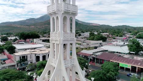 drone tilt revealing san vicente tower in central america 02