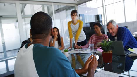 Executives-having-discussion-during-meeting