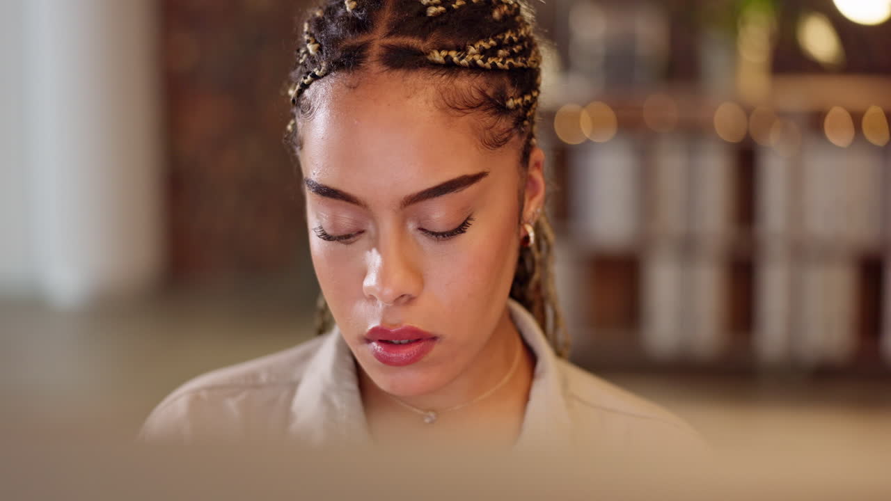 Face, focus and a business black woman typing