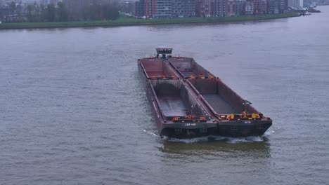 barge, propelled by reliable engine moves steadily through the water