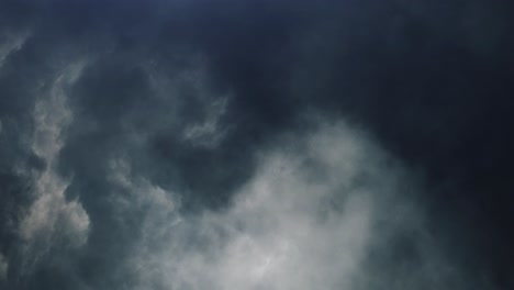 4k-lightning-flashes-inside-dark-clouds-in-the-sky,-thunderstorm