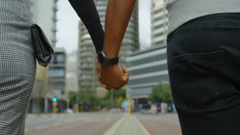 couple walking in city street 4k