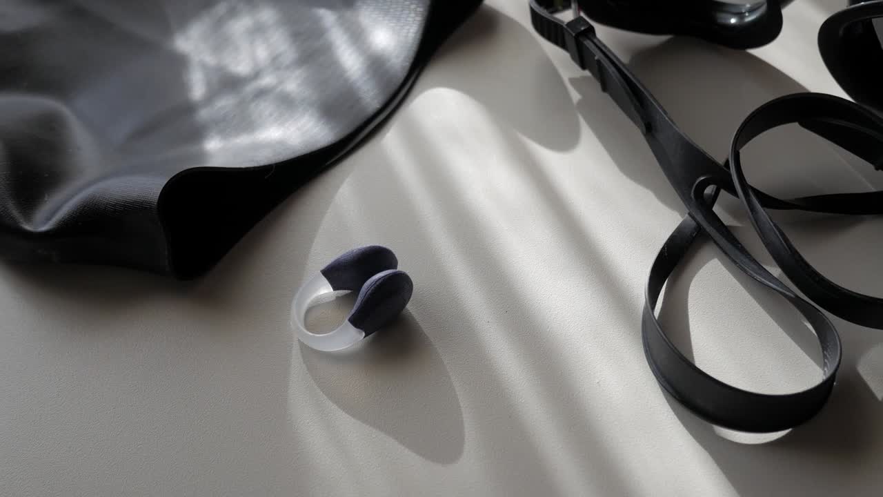 Swimming gear laid out, evoking preparation and focus on activity