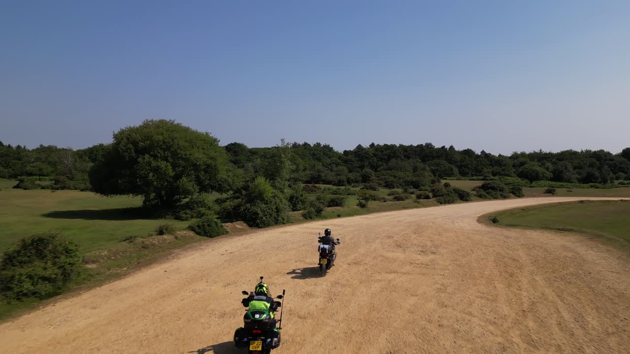 Off-Road Adventure: Drone Follows Two Motorbikes at New Forest