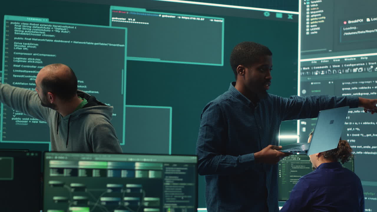 Governmental hackers analyzing cyber threats on big screens