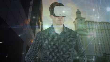 animation of caucasian businessman using vr headset and network of connections over cityscape