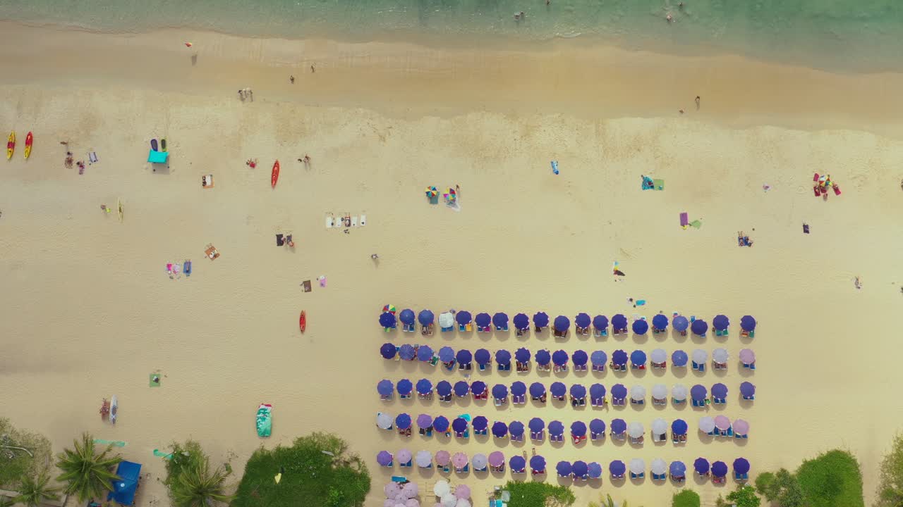 Aerial View of Crowded Beach with Umbrellas