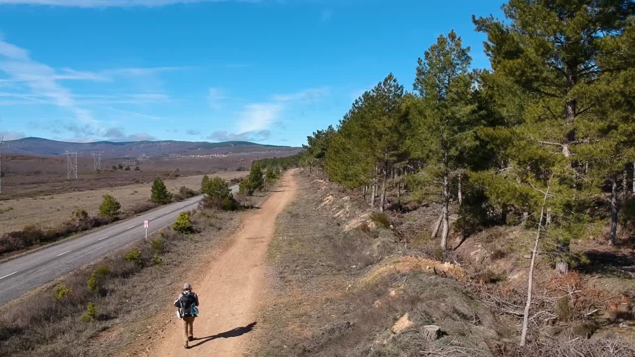 Lone man walking on Way of St