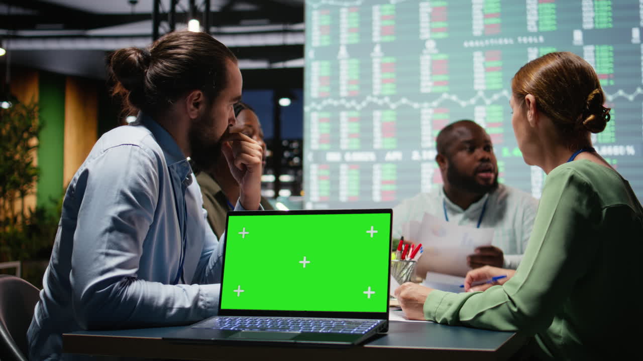 Corporate staff participate in late advisory board session with mockup
