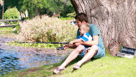 Man-teaches-to-his-son-fishing-