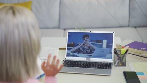 man sending kisses to his girlfriend online.