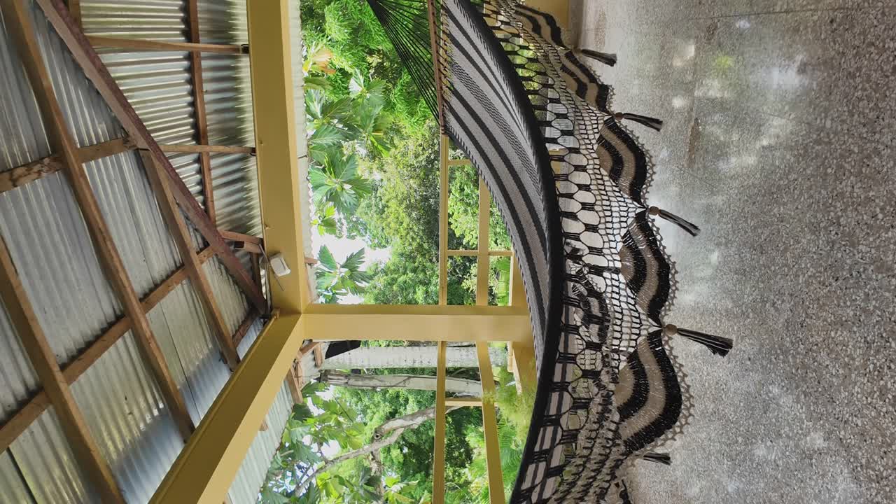 Vertical view of Hammock Maya or Hamaca Maya is a lightweight webbing made from nylon thread. It is woven from thin thread and can hold up to a thousand pounds.