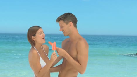 Cute-couple-eating-water-ices