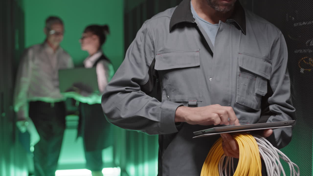 Technicians working in a data center