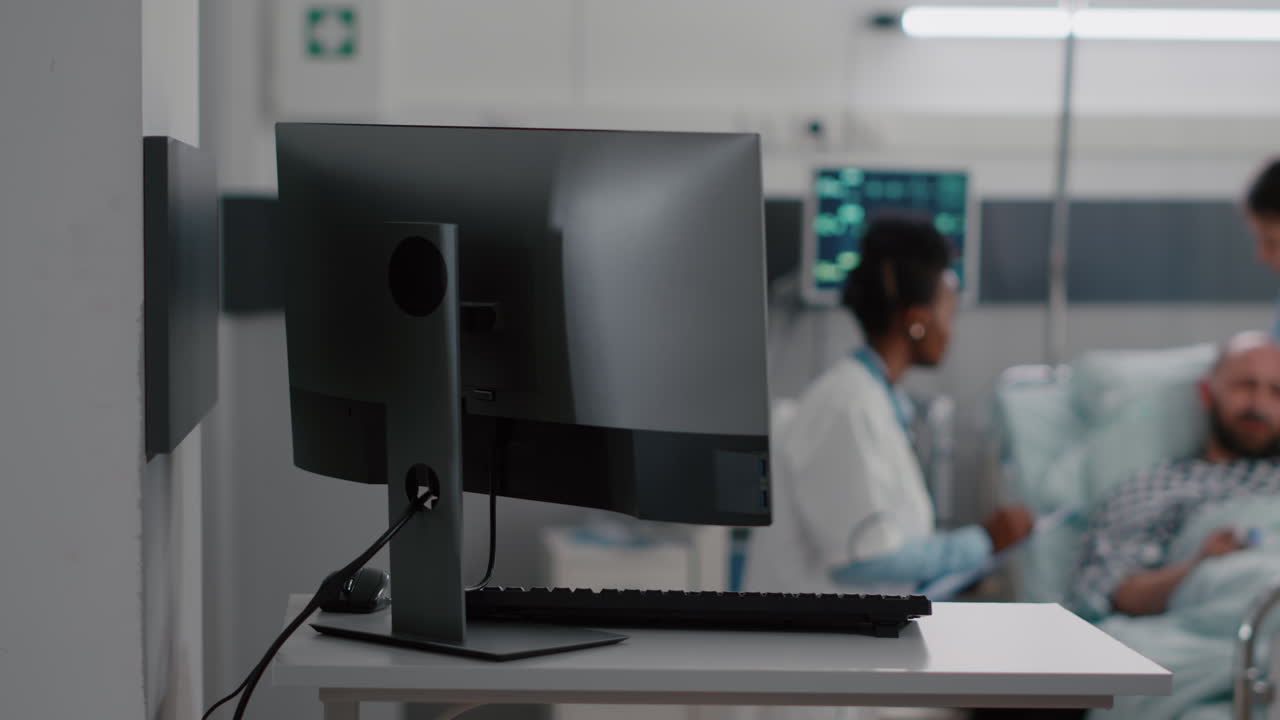 Afro american practitioner doctor discussing recovery treatment with sick man