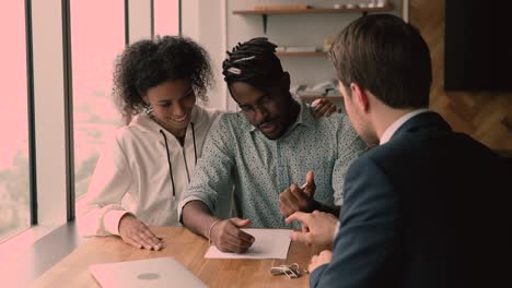 african couple sign agreement receive keys from new bought home