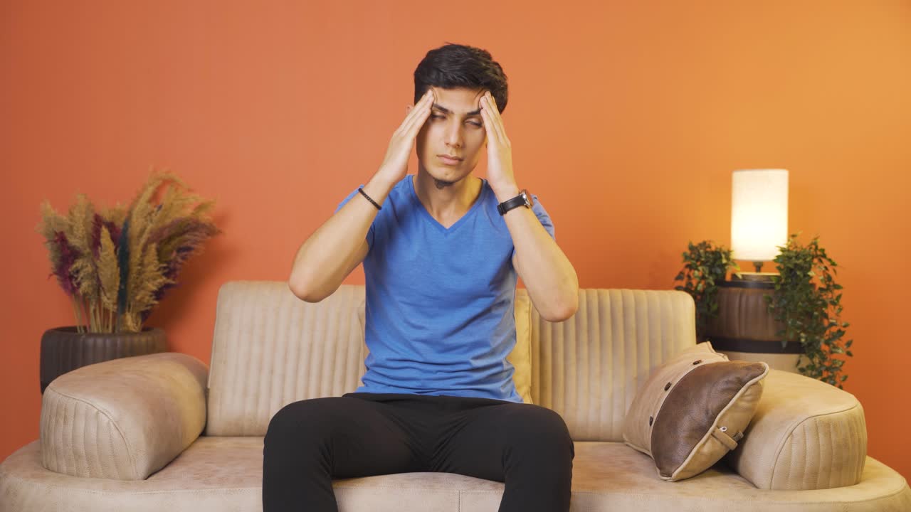 Man with migraine is experiencing pain.