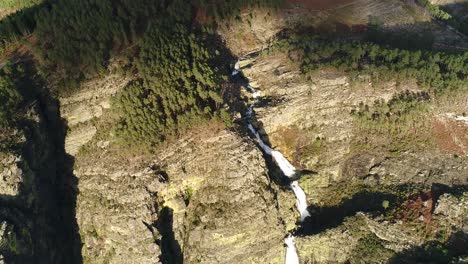 Fisgas-de-ermelo-waterfall-drone-aerial-view-in-Mondim-de-Basto,-most-beautiful-in-Portugal