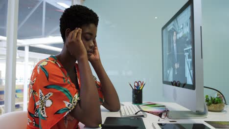 young woman working in a creative office