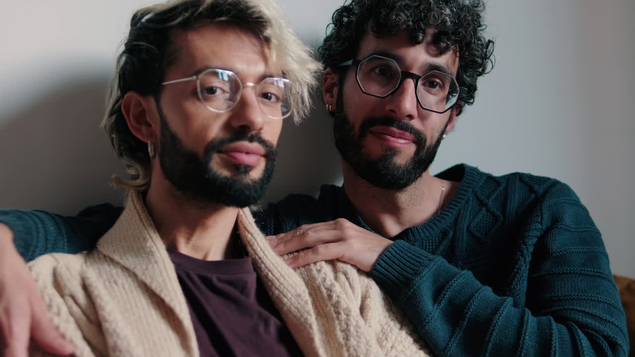 Gay Couple Relaxing at Home Together