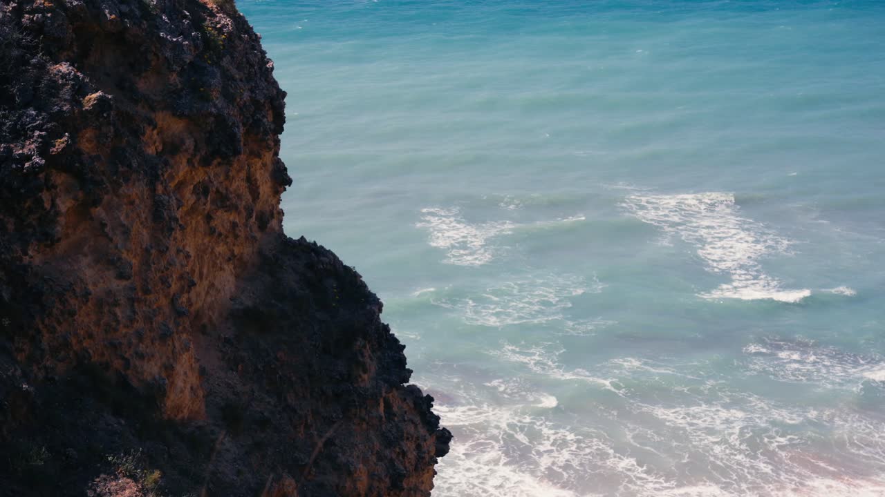 Rocky Cliffs During Summer At Ponta da Piedade Near Lagos, Portugal. Slow Motion Shot