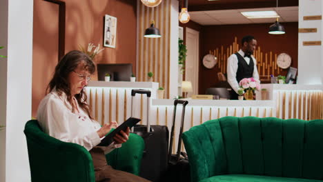 old tourist relaxing in lounge area