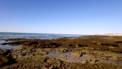 aerial slow flyover the mudflats at low tide, rocky point, puerto peñasco, gulf of california, mexico