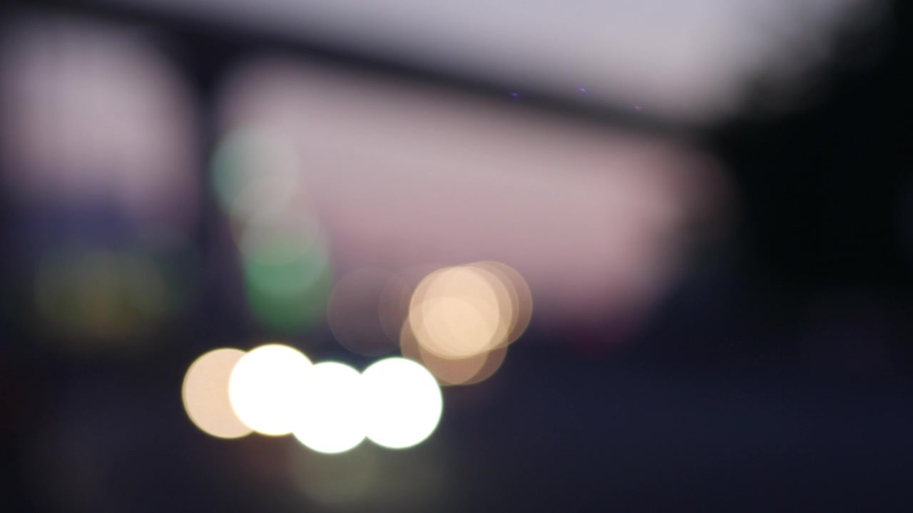 Abstract Bokeh Background of Moving City Lights at Night