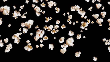 flying many popcorns on black background. white salty popcorn. healthy food. corn seed. 3d loop animation of popcorn rotating.