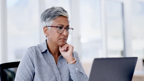 Senior business woman, laptop