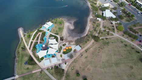 peninsula playground at broadwater parklands in marine parade, southport, queensland australia. aerial shot