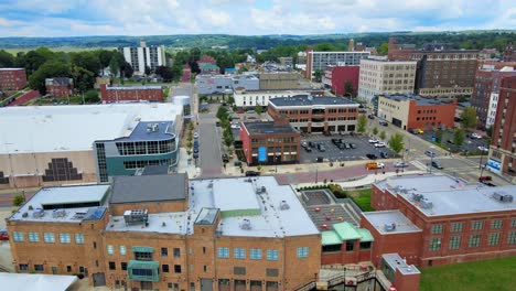 Aerial-drone-footage-of-downtown-Jamestown,-New-York,-during-summer-time-on-a-sunny-day