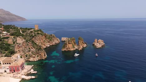 Beautiful-Aerial-View-Above-Tonnara-di-Scopello-in-Sicily,-Italy