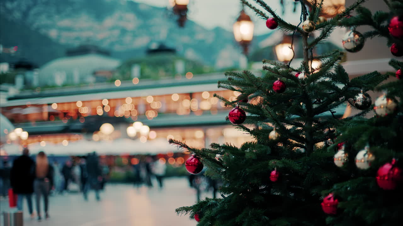 Close up of decorations on a Christmas tree in front of the Monte Carlo Casino in Monaco