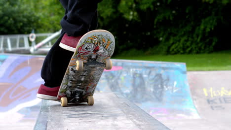 Young-skateboarder-skating-the-outdoor-skatepark