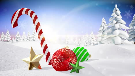 christmas decorations with candy cane and ornaments over snowy landscape animation