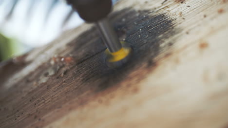 drilling hole onto wood slowmotion