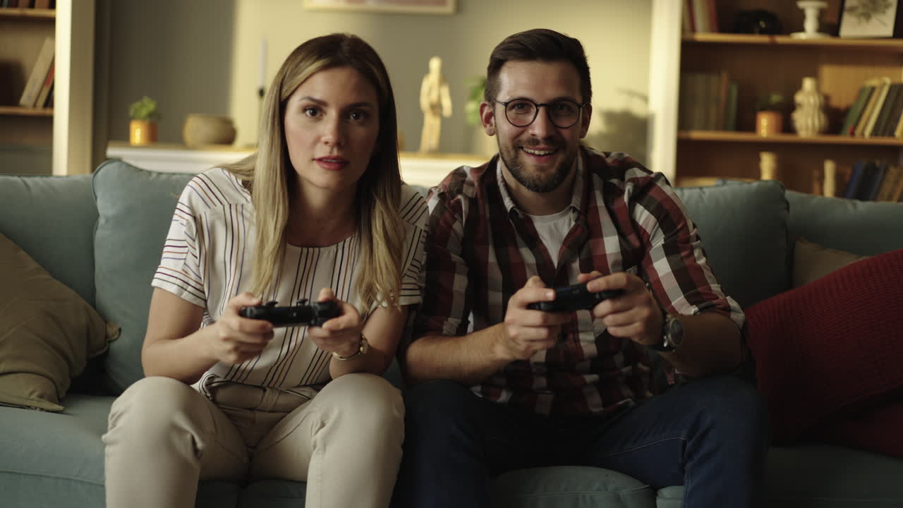 Couple having fun playing video games