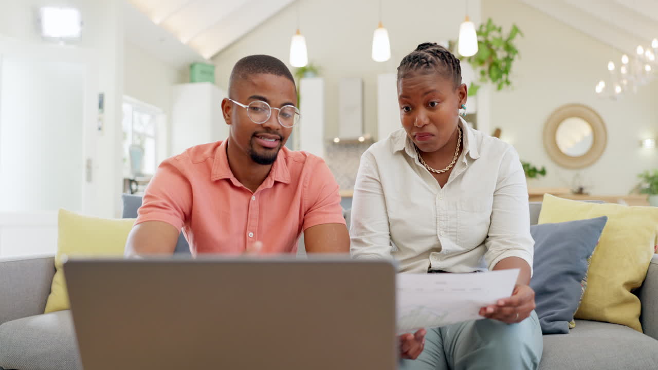 Finance, documents and couple with laptop on sofa
