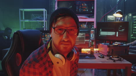 laughing hacker in server room