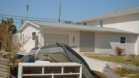 hurricane aftermath: damaged home and furniture