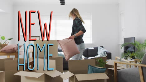 animation of new home text over gay lesbian couple unpacking boxes at home