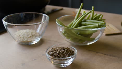 green beans, sesame seeds, and cumin seeds