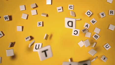 plastic letters bouncing and spelling out autism