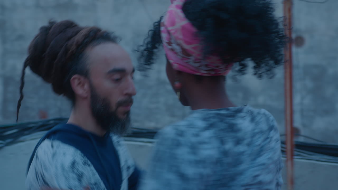 Couple Dancing Tango on Rooftop in the Evening