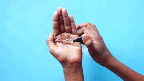 Applying Hand Sanitizer