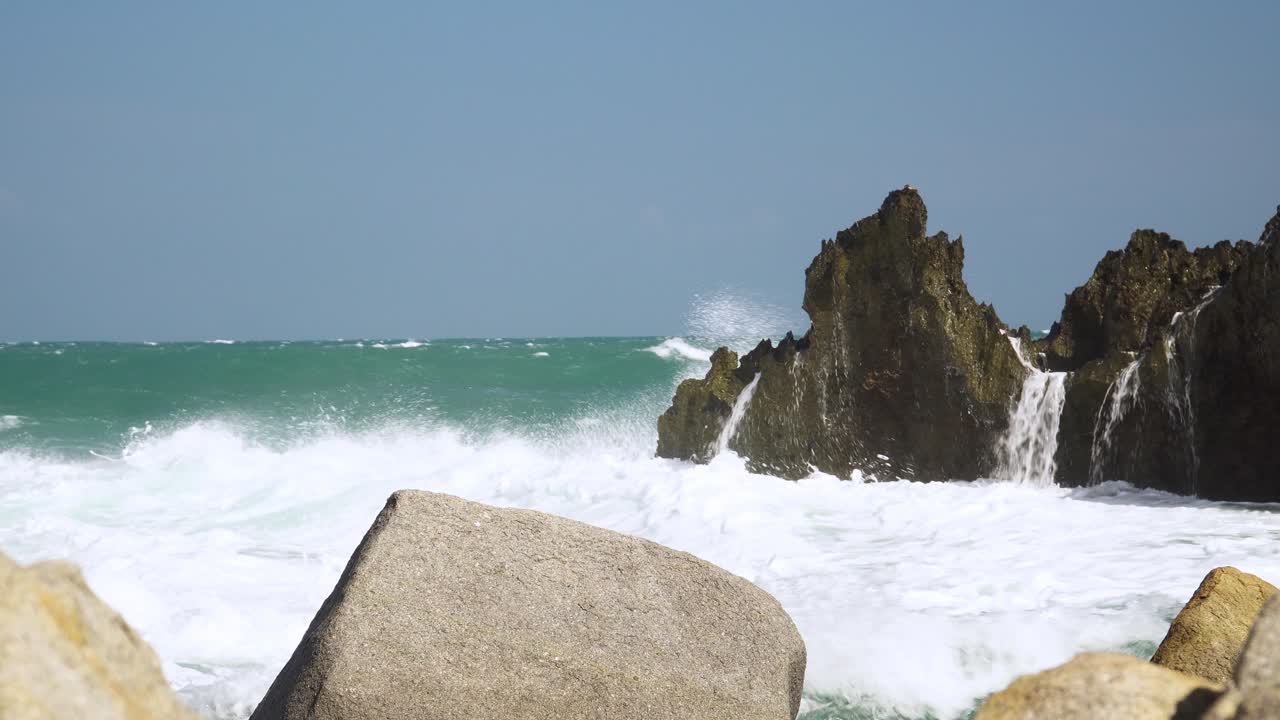 Rocky coast of Hang Rai, Vietnam washed by powerful sea tides