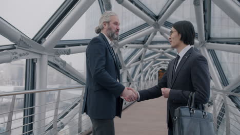 business meeting on an urban bridge